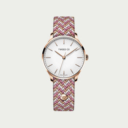 Montre Rose en or rose avec son bracelet couleur rose, blanc et brun clair. 