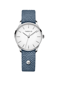 Montre en acier Tweed Co. avec bracelet tressé élastique couleur jeans et charm personnalisé