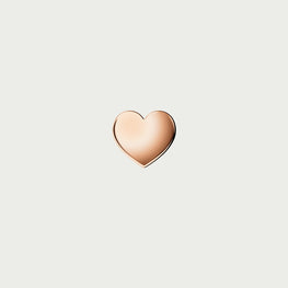 Charm cœur en or rose Symbole de féminité et d’amour
